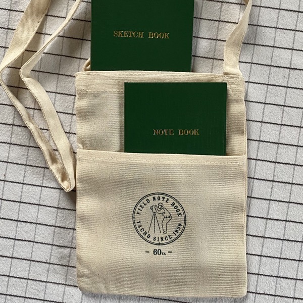 notebooks in pouch