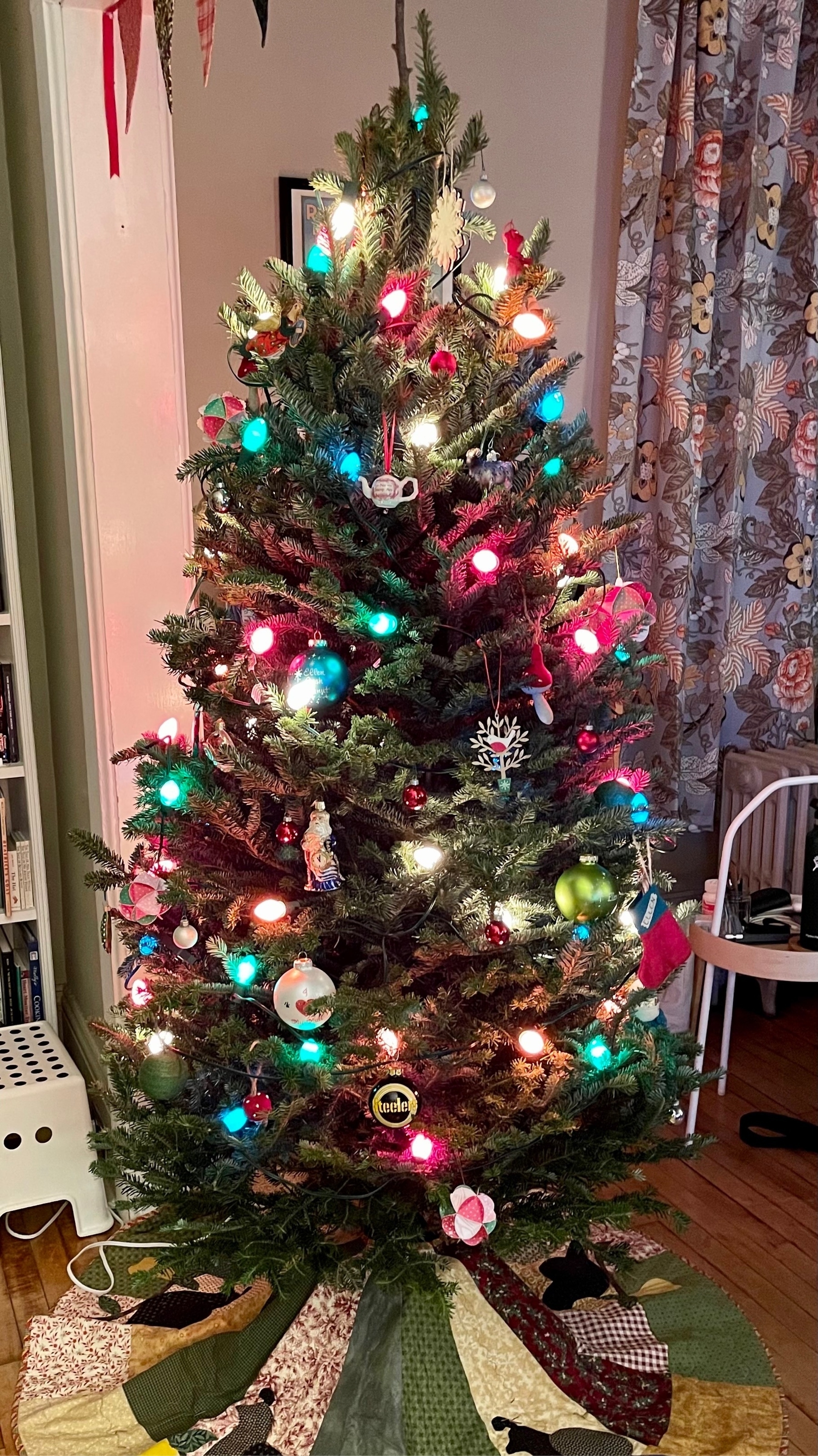 Christmas tree with ornaments and colored lights